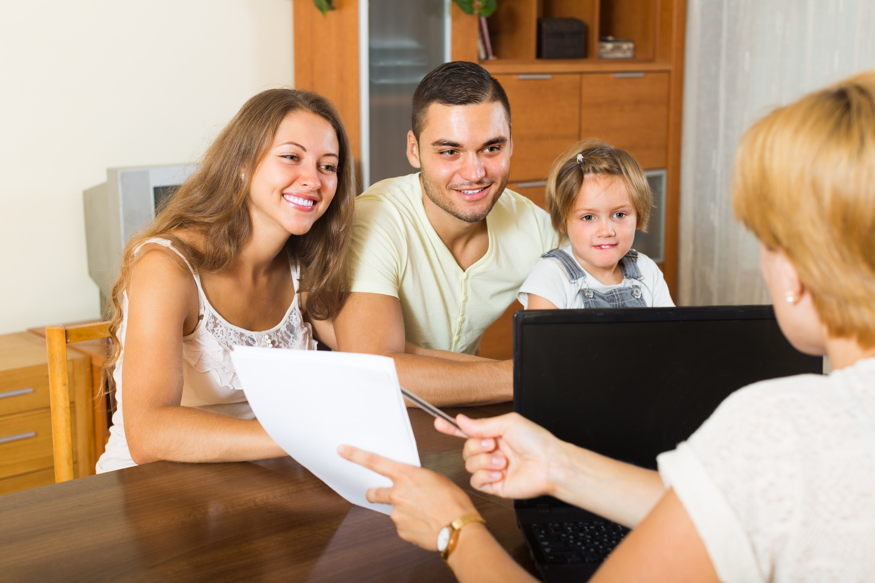 Family with insurance agent